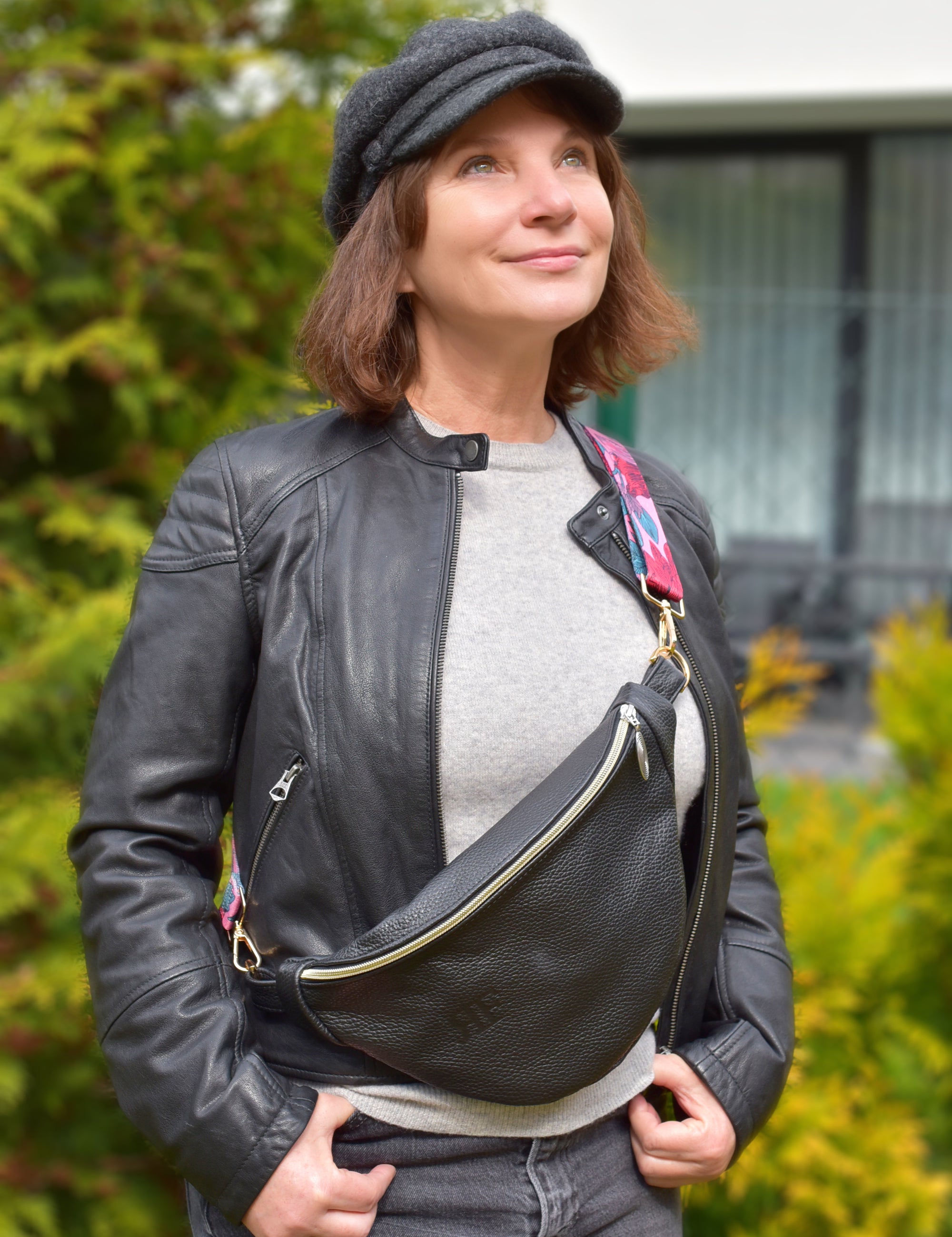 woman wearing a black fanny bag 